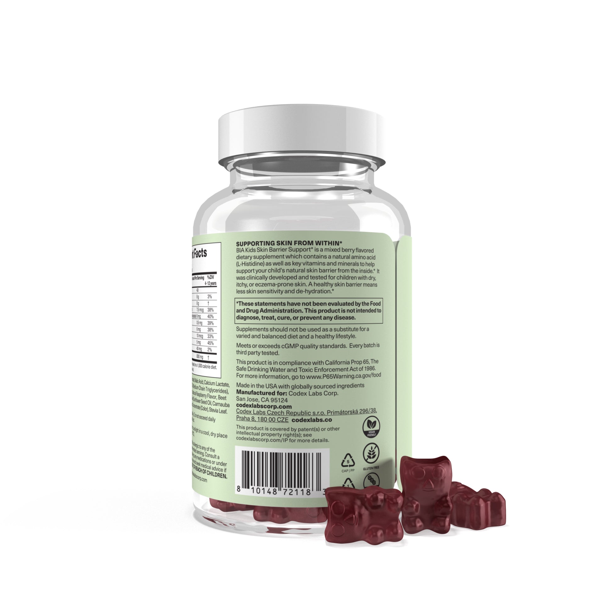 Supplement bottle with gummy bears on a white background