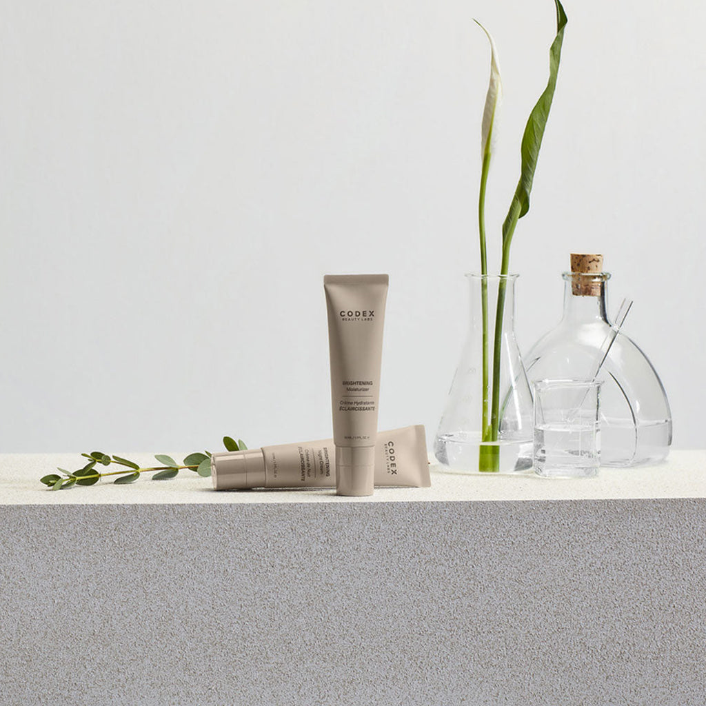 AntüComplex® displayed on a stone background.