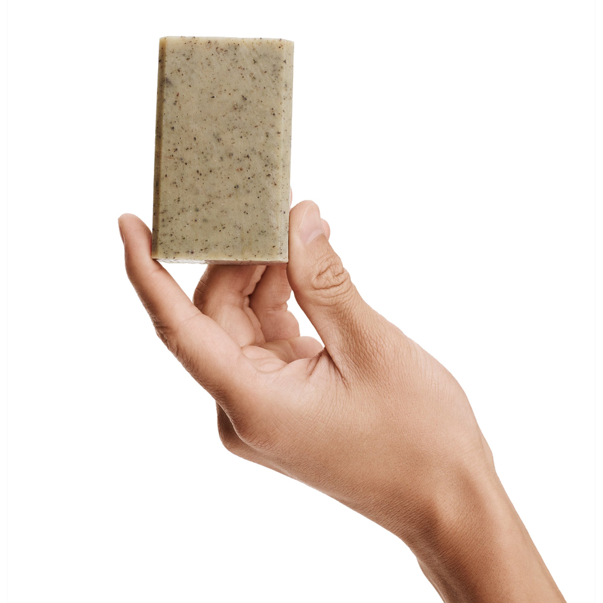 Image of a model holding a bar of Bia Balancing Soap.