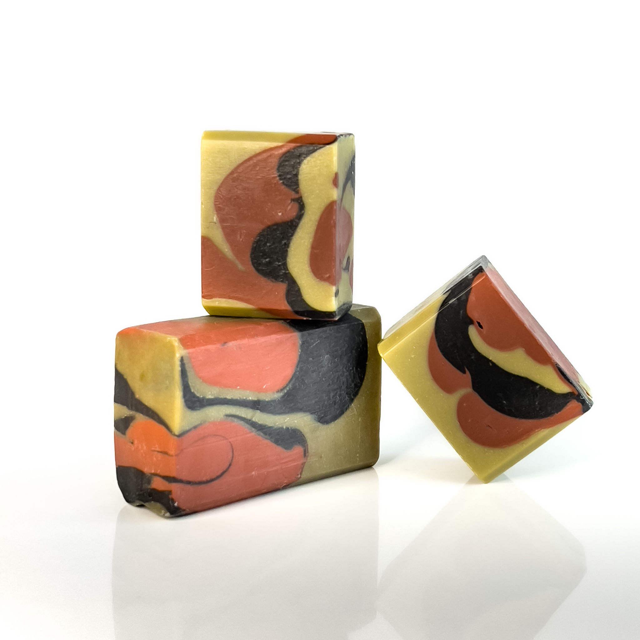 Image of 3 bars of Kwanzaa soap stacked on top of each other.