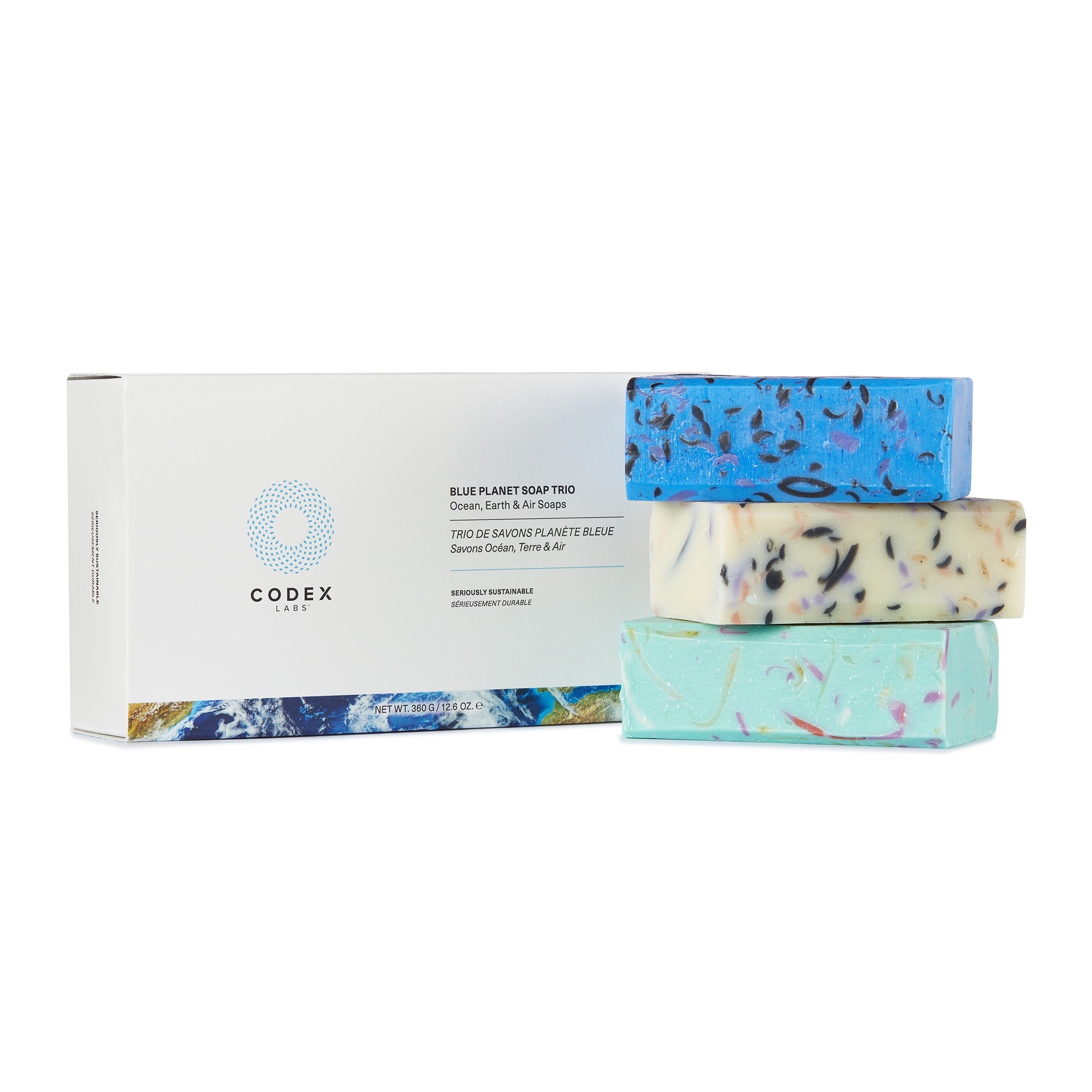 Blue Planet Soap Trio box with three bars of soap stacked on top of one another next to its packaging..