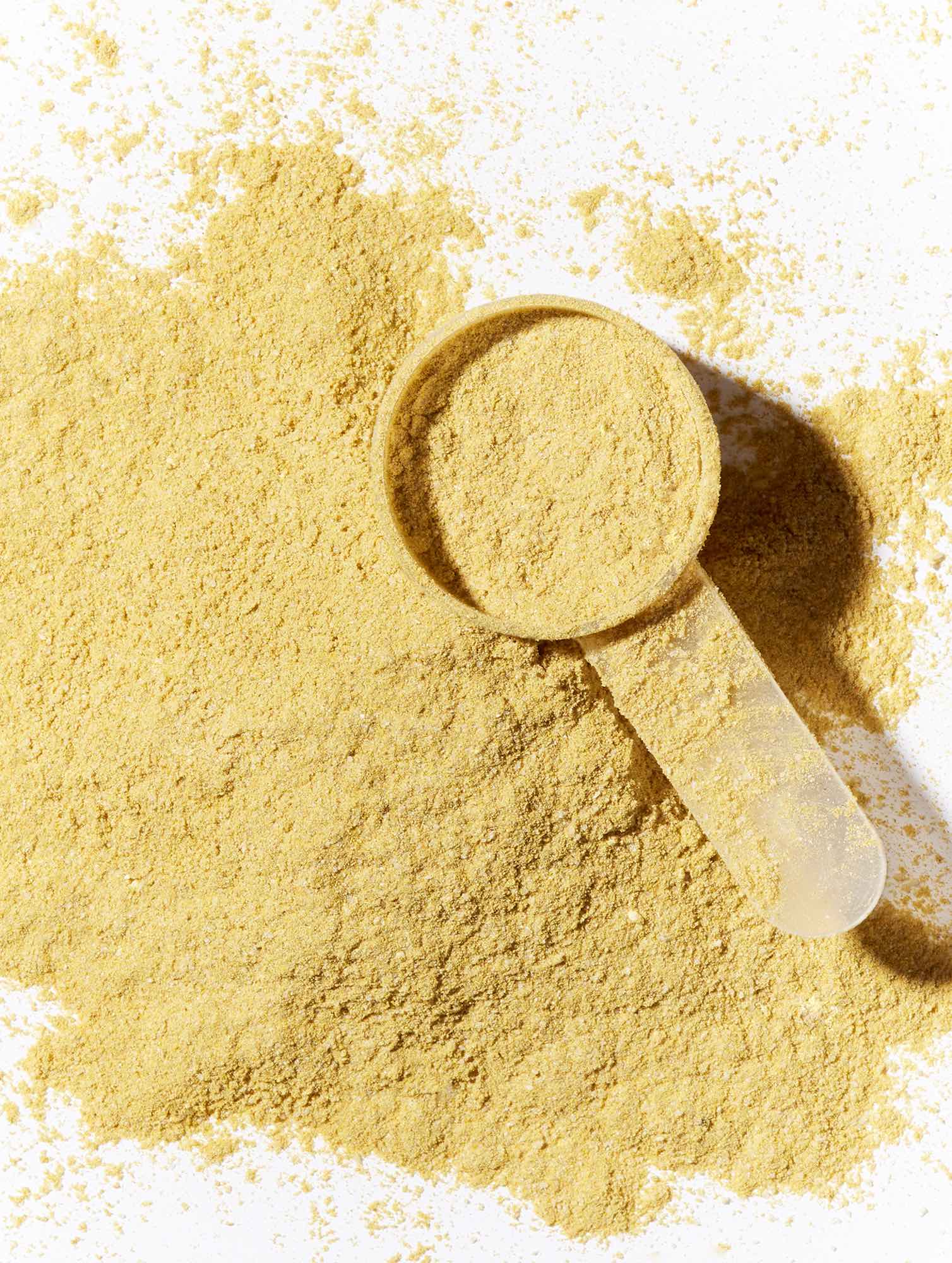 Image of the Shaant Skin De-stress powder with a serving scoop on a white background.